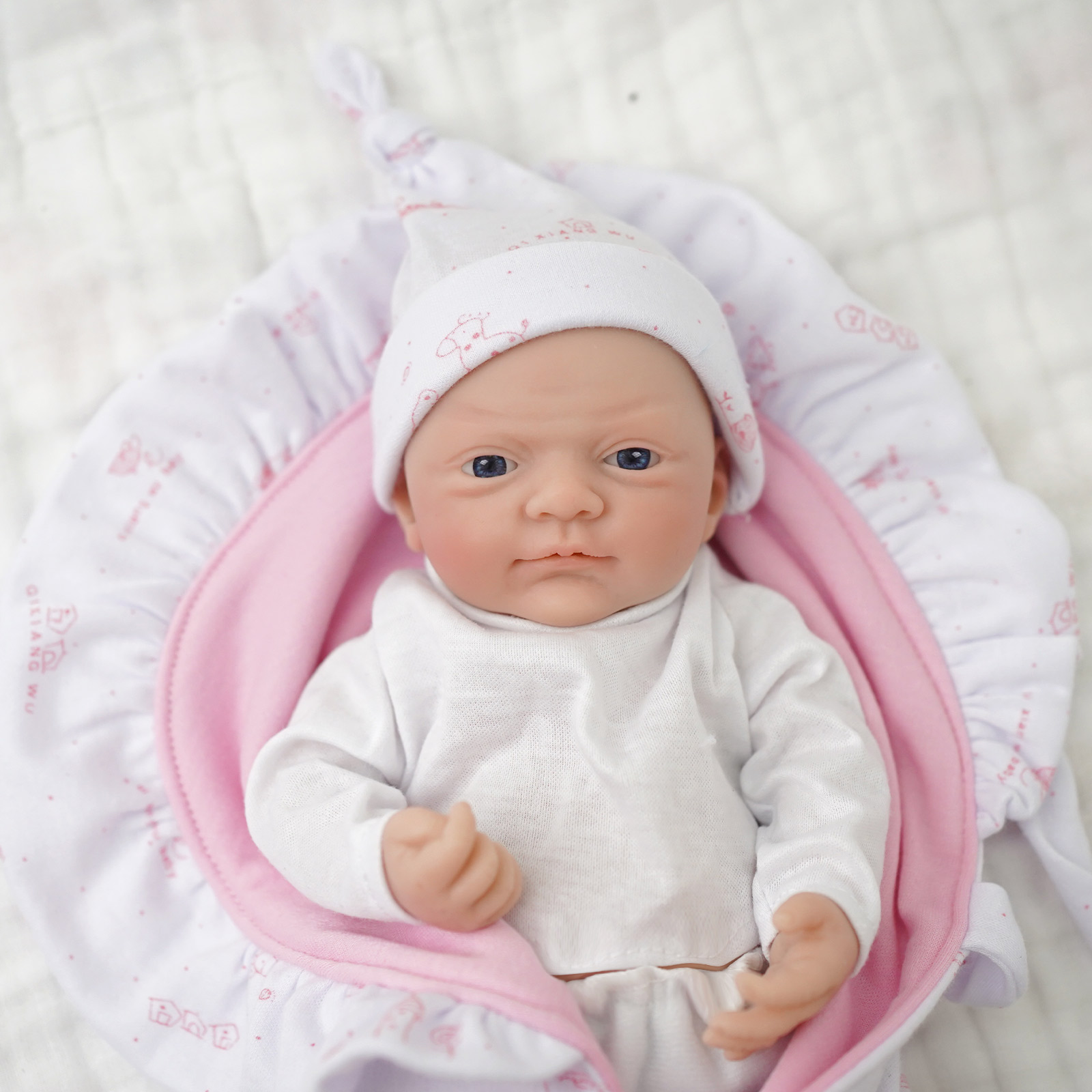 Muñeca bebé de silicona de cue - Kids Educational Songs reseña y precio